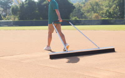 Male using Monster Broom Drag Mat
